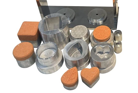 Pneumatic Bath Bomb Press with various customizable molds and their unique shaped bath bombs.